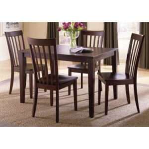 A dark brown dining table set for four