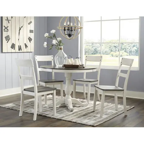 A white round dining table set