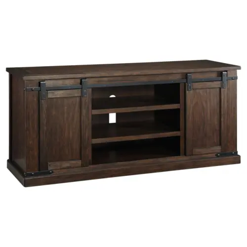 A brown entertainment center with sliding doors and shelves.