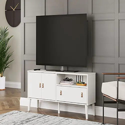A tv stand with three doors and two drawers.