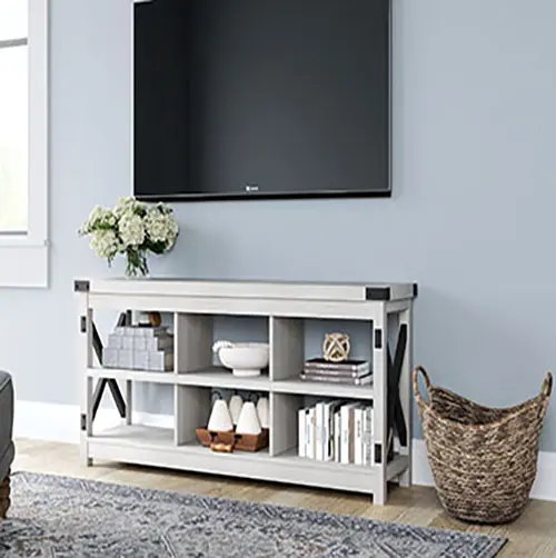 A tv stand with two shelves and a basket on top.