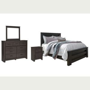 A bed, dresser and mirror are shown in this image.