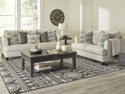 A living room with two couches and a coffee table