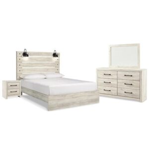 A white bed with two night stands and a mirror.
