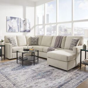 A living room with a couch and chair