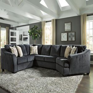A living room with a couch and a chair