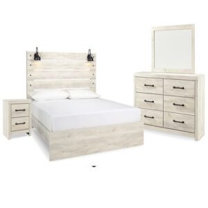 A white bed with two dressers and a mirror.