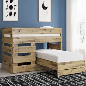 A bunk bed with two beds and a mattress on top of it.