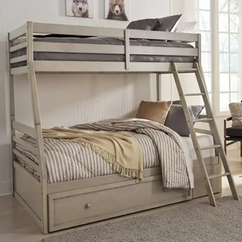 A bunk bed with a trundle in the middle of it