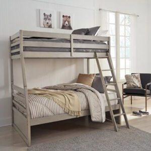 A bunk bed with two sets of stairs on each side.