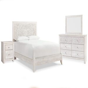 A white bed with two nightstands and mirror.