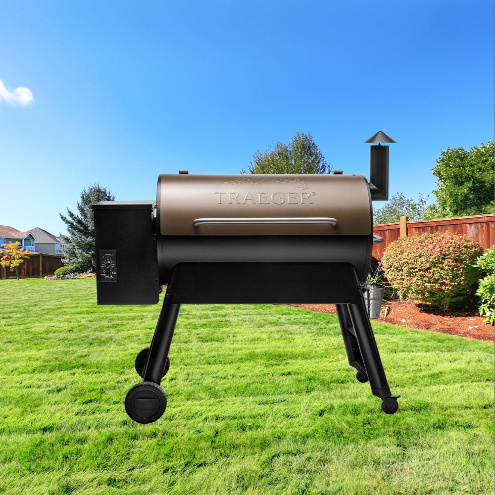 A bbq grill sitting in the middle of a yard.